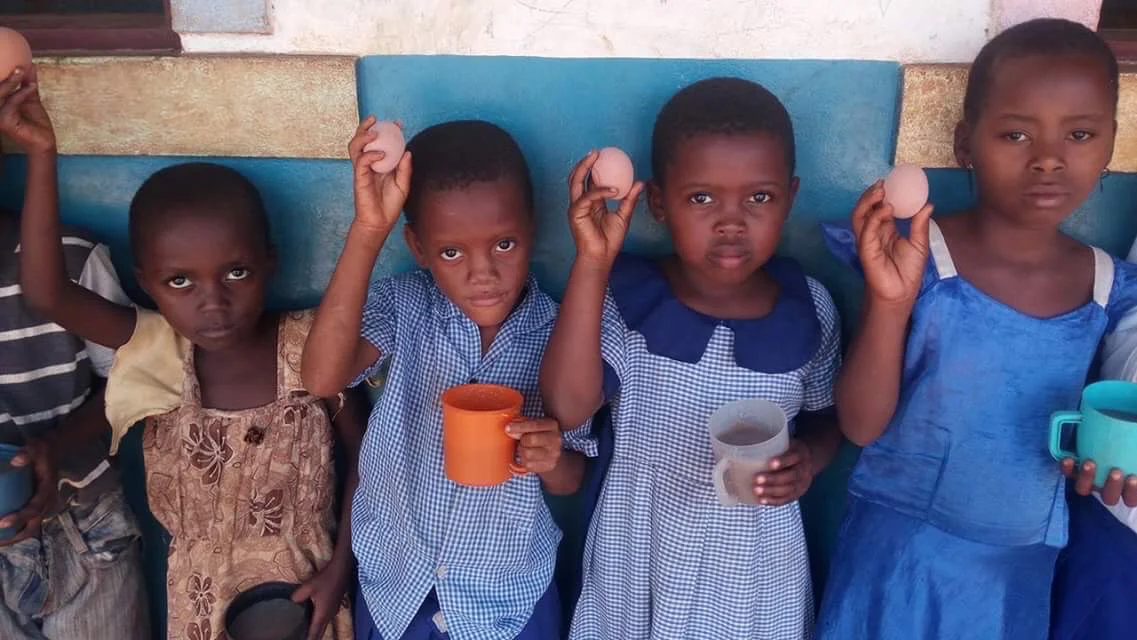 The Trust provides free range eggs to children to battle malnutrition